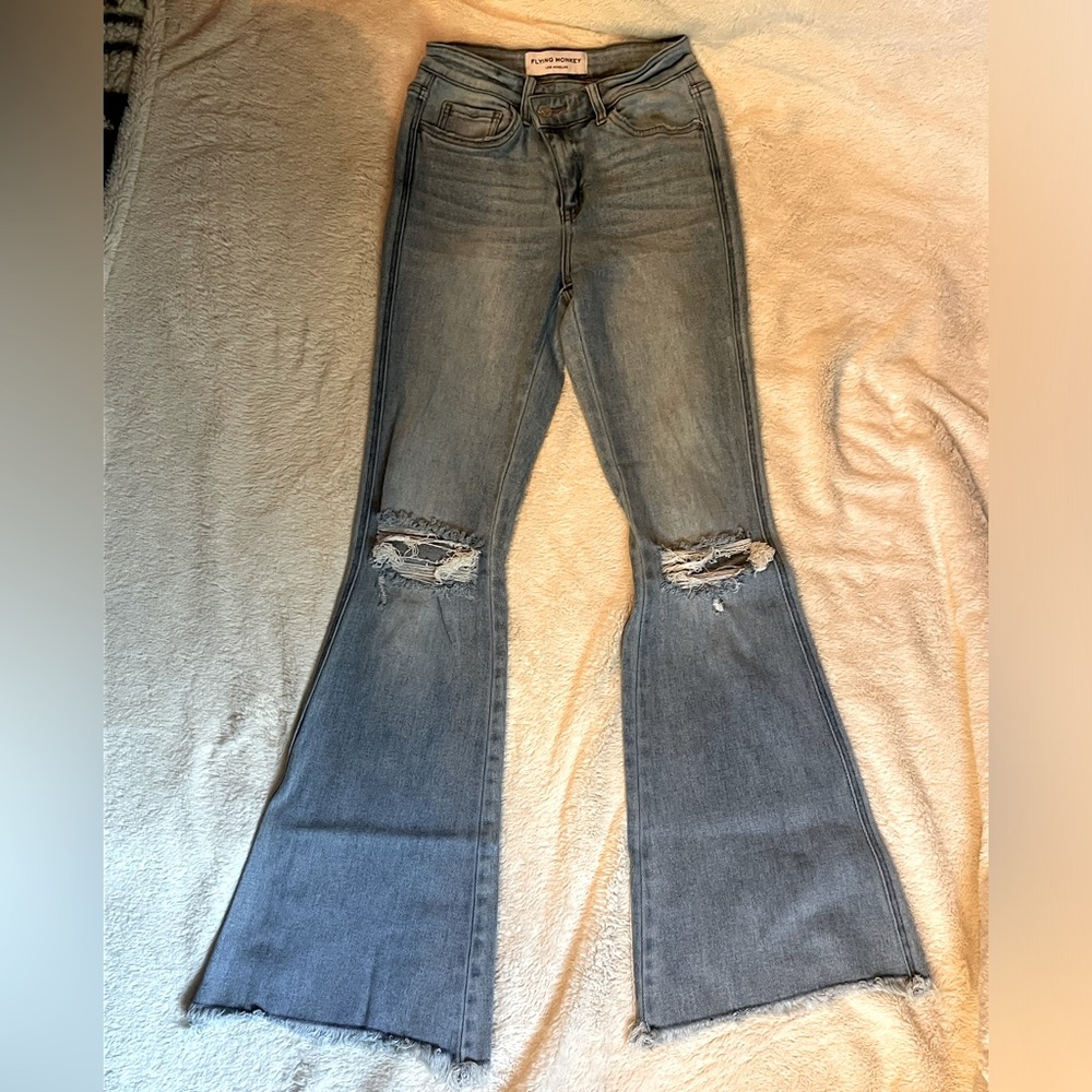 Flying monkey flare jeans from buckle!! Size 24 waist and 32 length!!